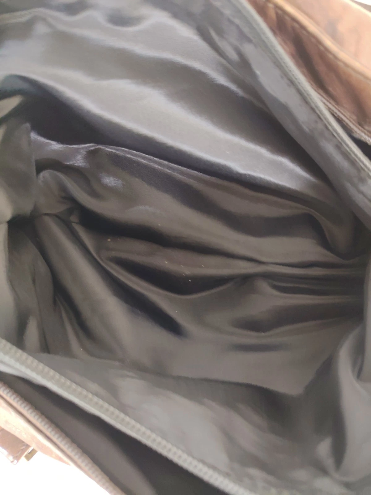 Braune Damenhandtasche aus Leder und Polyesterfutter